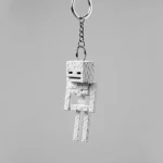 جاکلیدی اسکلت ماینکرفت با طراحی الهام گرفته از Skeleton محبوب بازی Minecraft. ساخته شده با پرینت سه‌بعدی باکیفیت، مناسب کلید، کیف، کوله‌پشتی و کلکسیون گیمرها.